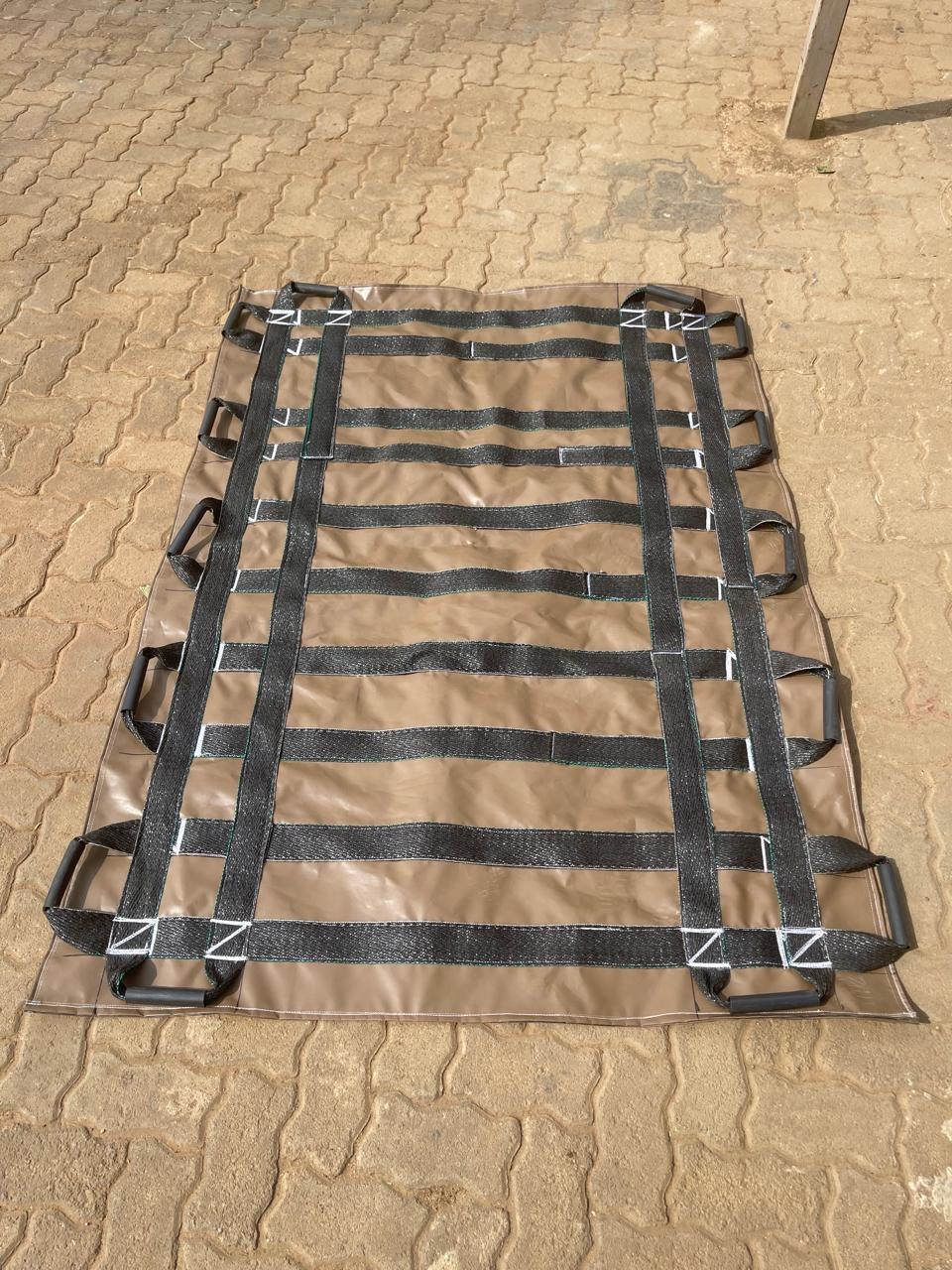Reinforced carry sail with webbing straps and handle loops