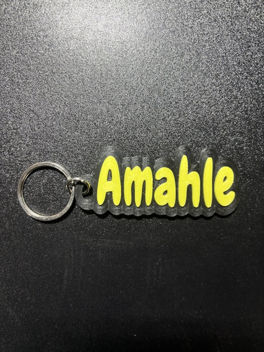 Name tag Amahle, clear base, yellow letters